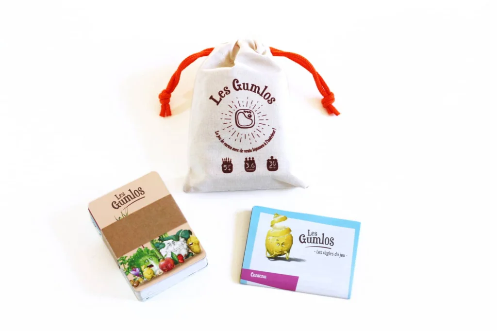 Jeu de cartes Les Gumlos avec sa pochette en tissu et ses règles
