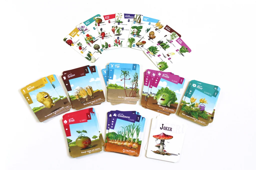 Une sélections de cartes légumes du jeu Les Gumlos : la salade, le blé la canne à sucre, la fleur de courgette, la pomme de terre.